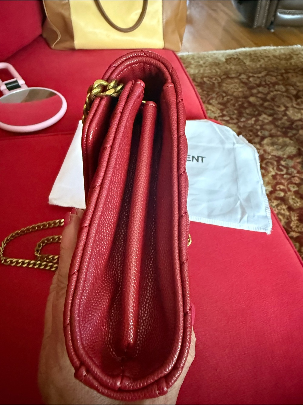 Yves Saint Lauren red leather clutch with gold chain. - Picture 7 of 7